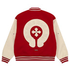 Red and cream varsity jacket back with large logo patch and striped hem