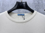 Prada cream sweater neckline with ribbed crewneck collar and PRADA label