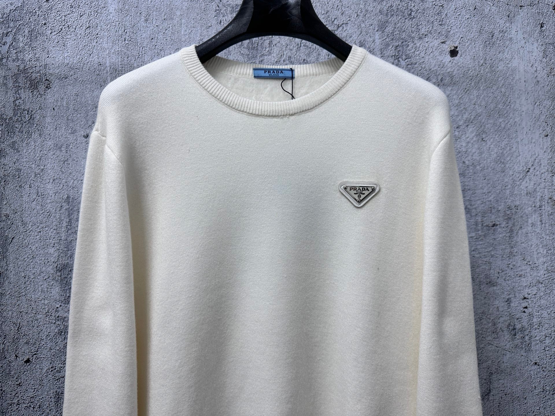Prada cream long-sleeve sweater with crewneck and triangle PRADA logo detail