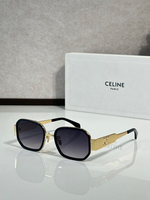 Celine sunglasses with black round frames and dark lenses, gold-tone temples