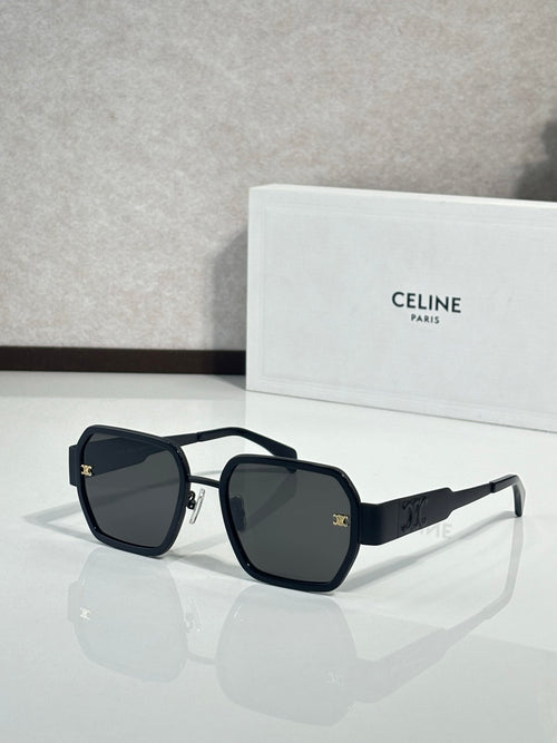 Square dark blue sunglasses with dark lenses and gold logo detailing on temples