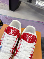 Louis Vuitton red-and-white low-top sneakers, close-up of tongue and lace panel