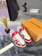 Louis Vuitton red-and-white lace-up sneakers with visible LV logo on red panels