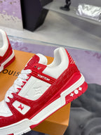 Louis Vuitton red-and-white low-top sneakers close-up of side and LV logo details