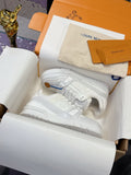 Louis Vuitton women's white lace sneakers, embossed logo and blue lace tag