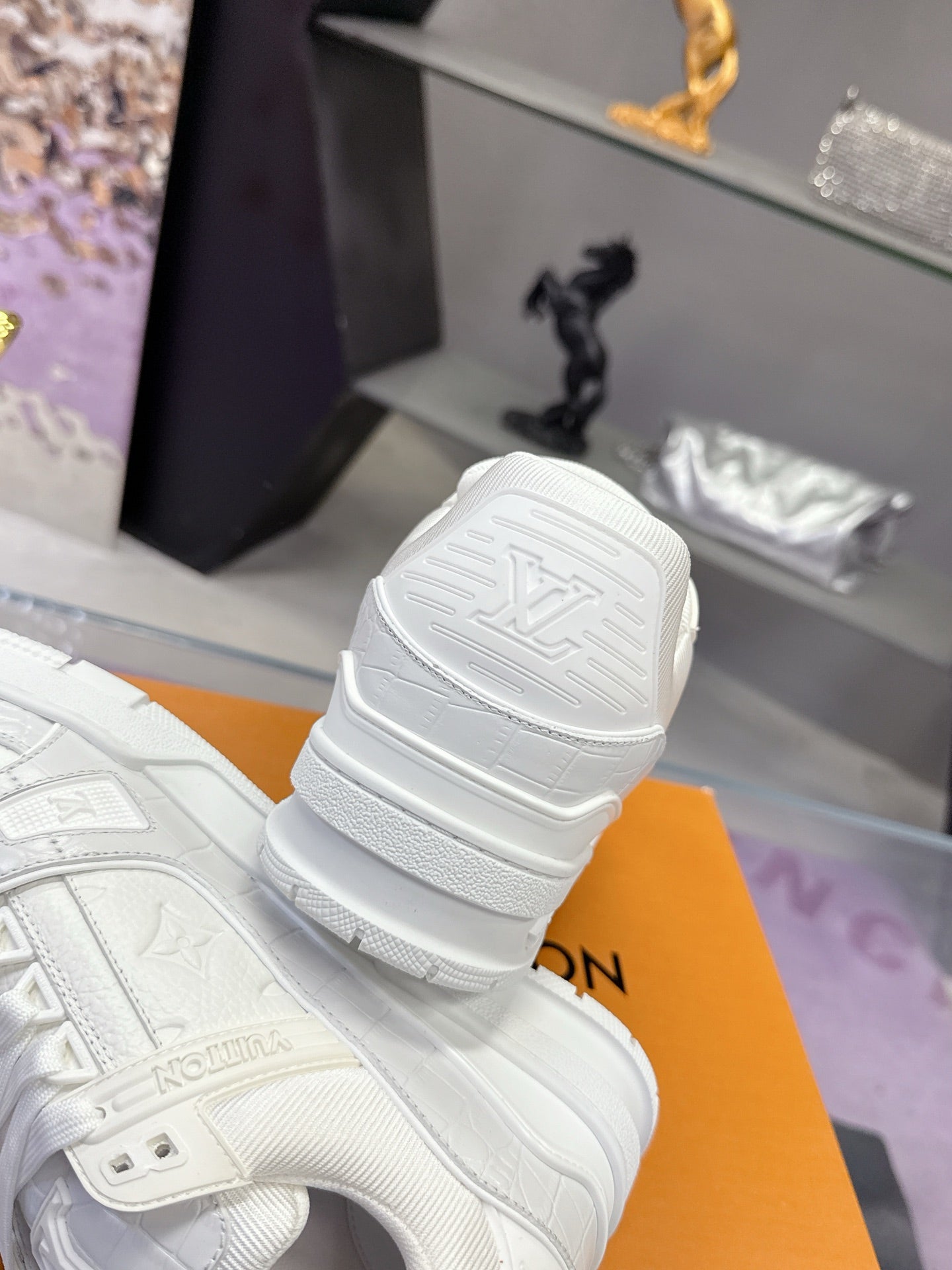 Louis Vuitton women's white lace sneakers, stacked sole side view