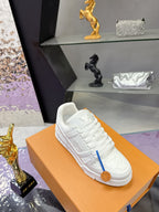 Louis Vuitton women's white lace sneakers, embossed upper on orange box