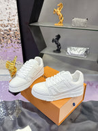 Louis Vuitton women's white lace sneakers pair, angled front view
