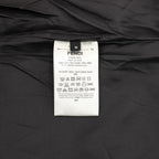 Black varsity jacket interior with FENDI size and care label tag