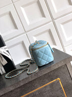 Chanel light blue quilted mini shoulder bag with chain strap and top zipper