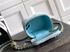 Chanel light blue mini shoulder bag open view with interior pocket and chain strap