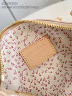 Louis Vuitton interior leather brand patch on beige monogram fabric lining