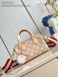 Louis Vuitton mini handbag in tan monogram canvas with top handles and key pouch