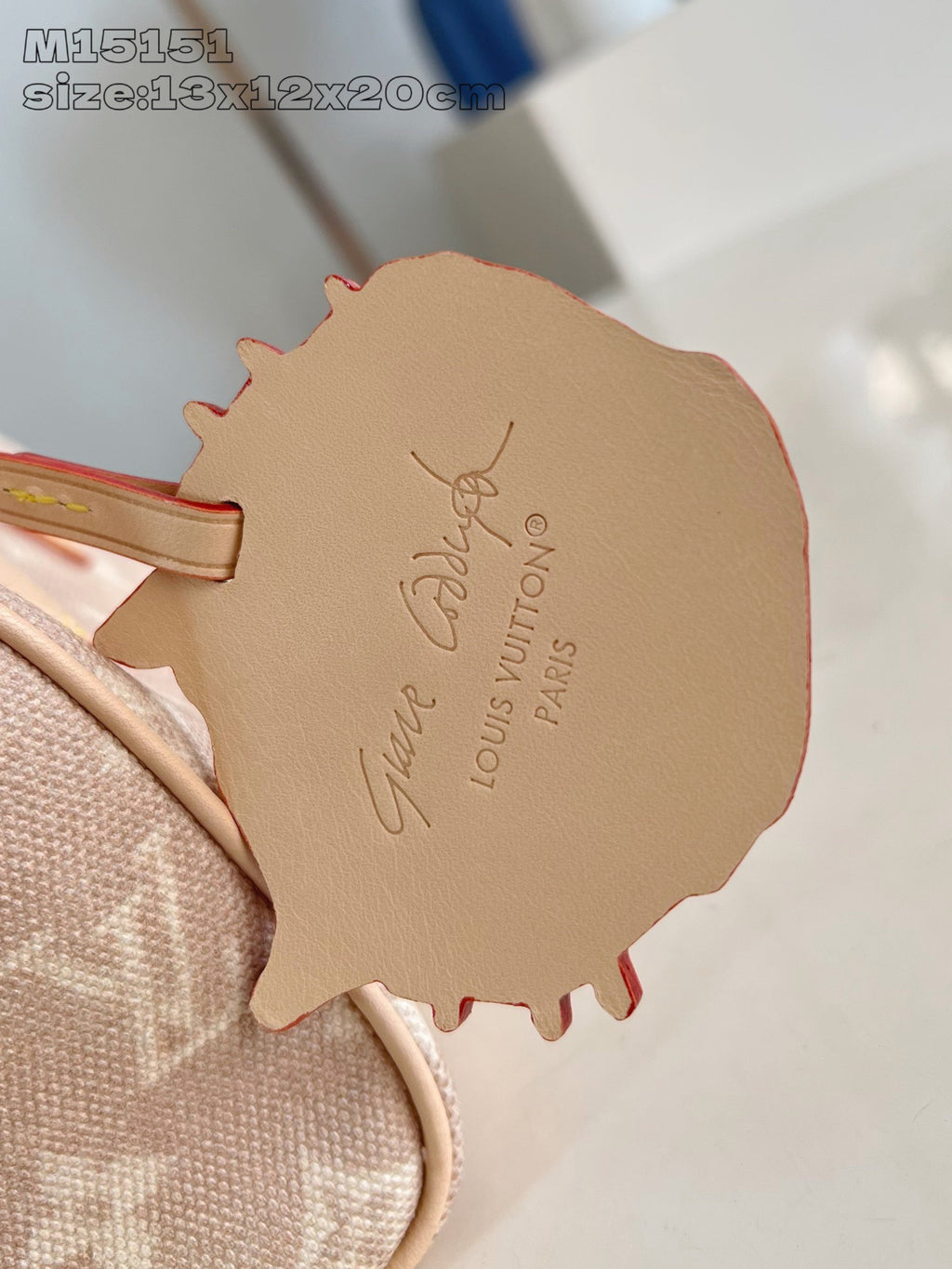 Louis Vuitton tan leather bag patch with embossed signature text