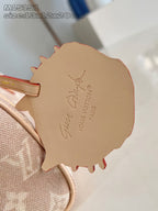 Louis Vuitton tan leather bag patch with embossed signature text