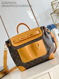 Louis Vuitton monogram handbag with tan leather trim and top handle, crossbody strap