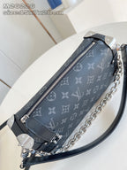 Crossbody bag: top zip slider, dark monogram fabric, chain strap and side tab