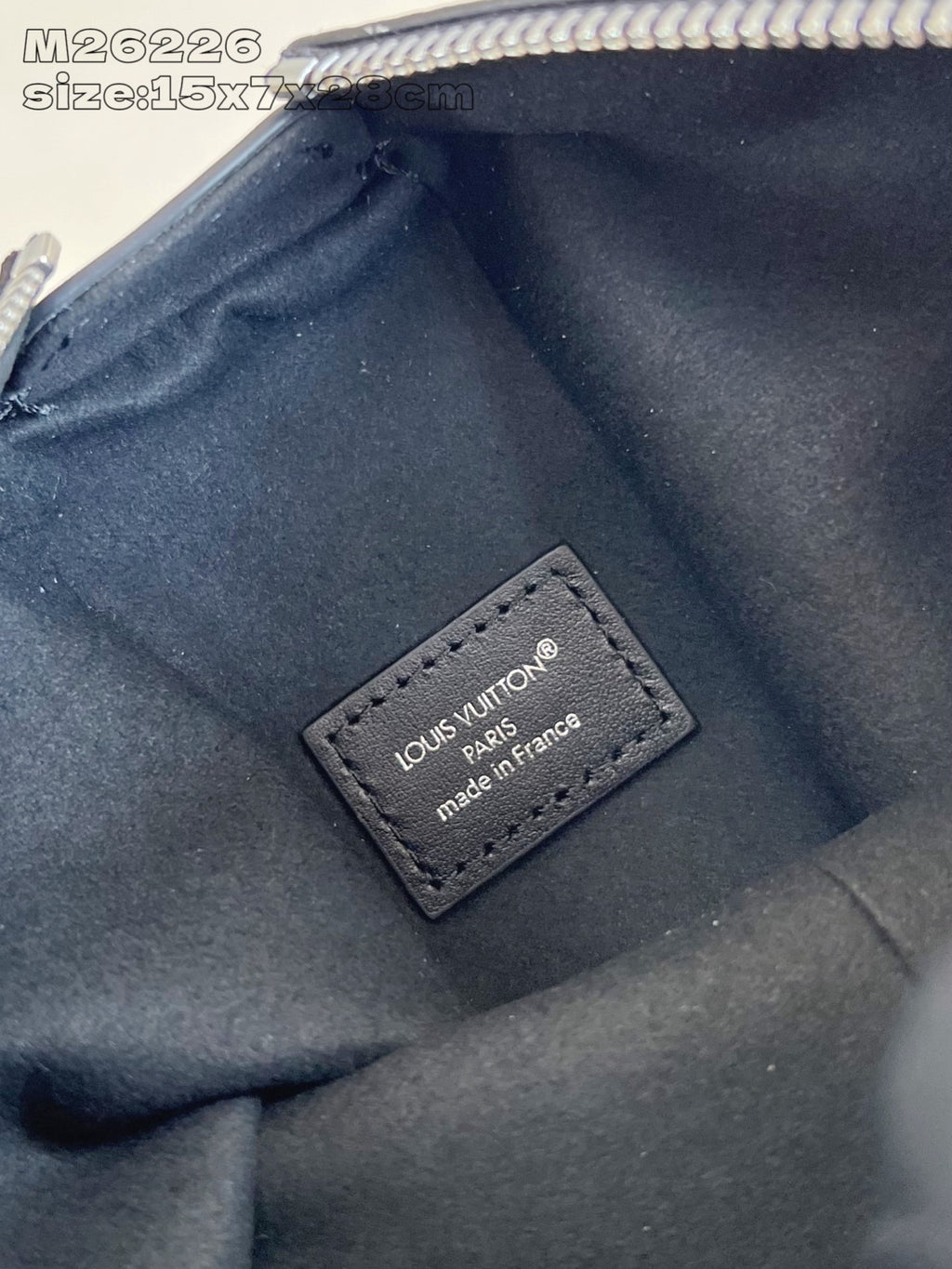 Crossbody bag interior label: Louis Vuitton Paris, made in France text