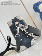Crossbody bag corner view with chain strap and top handle hardware