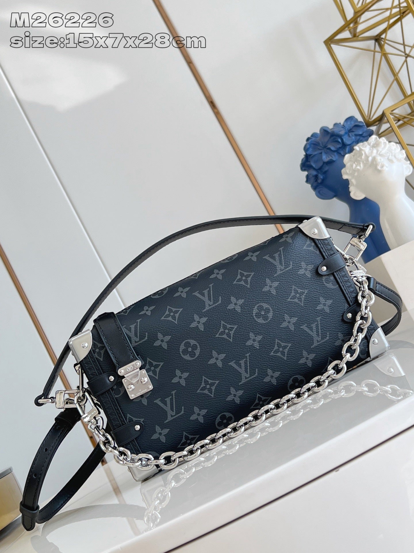 Louis Vuitton bag, dark monogram canvas, chain strap, front flap with lock