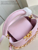 Louis Vuitton mini handbag interior in light pink leather with gold clasp hardware