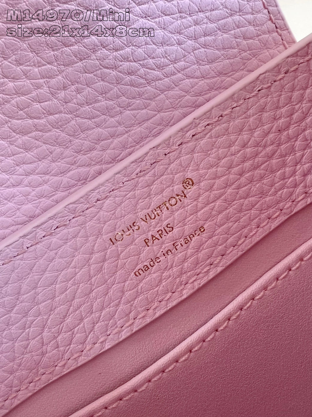 Louis Vuitton mini handbag light pink with embossed “Louis Vuitton Paris made in France”