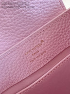 Louis Vuitton mini handbag light pink with embossed “Louis Vuitton Paris made in France”