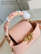 Louis Vuitton mini handbag top view, pink leather and gold handle rings
