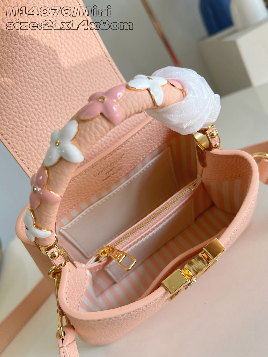 Louis Vuitton mini handbag open top, pink interior lining and gold zipper pull
