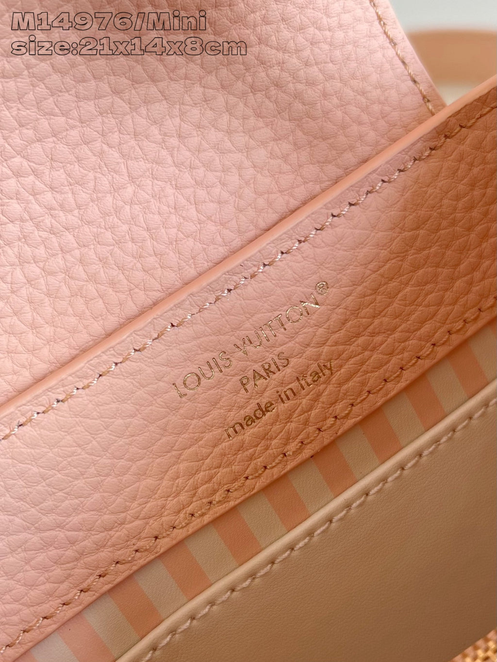 Louis Vuitton mini handbag trim, 'made in' text along pink leather edge