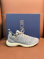Dior unisex lace-up sneakers with light blue knit upper and cream sole