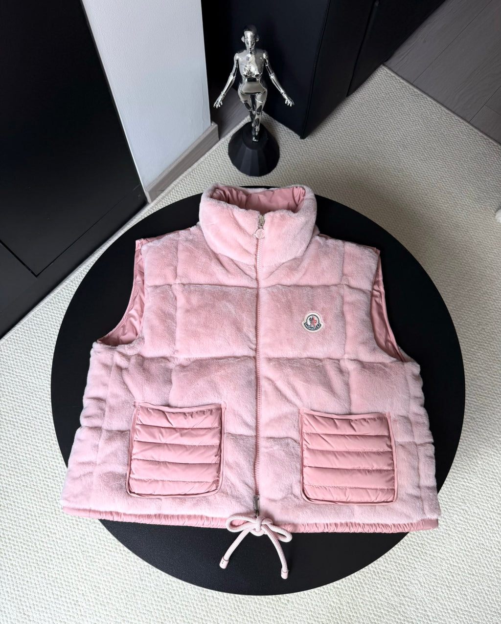 Moncler pink padded hooded gilet with front zip and drawstring hem