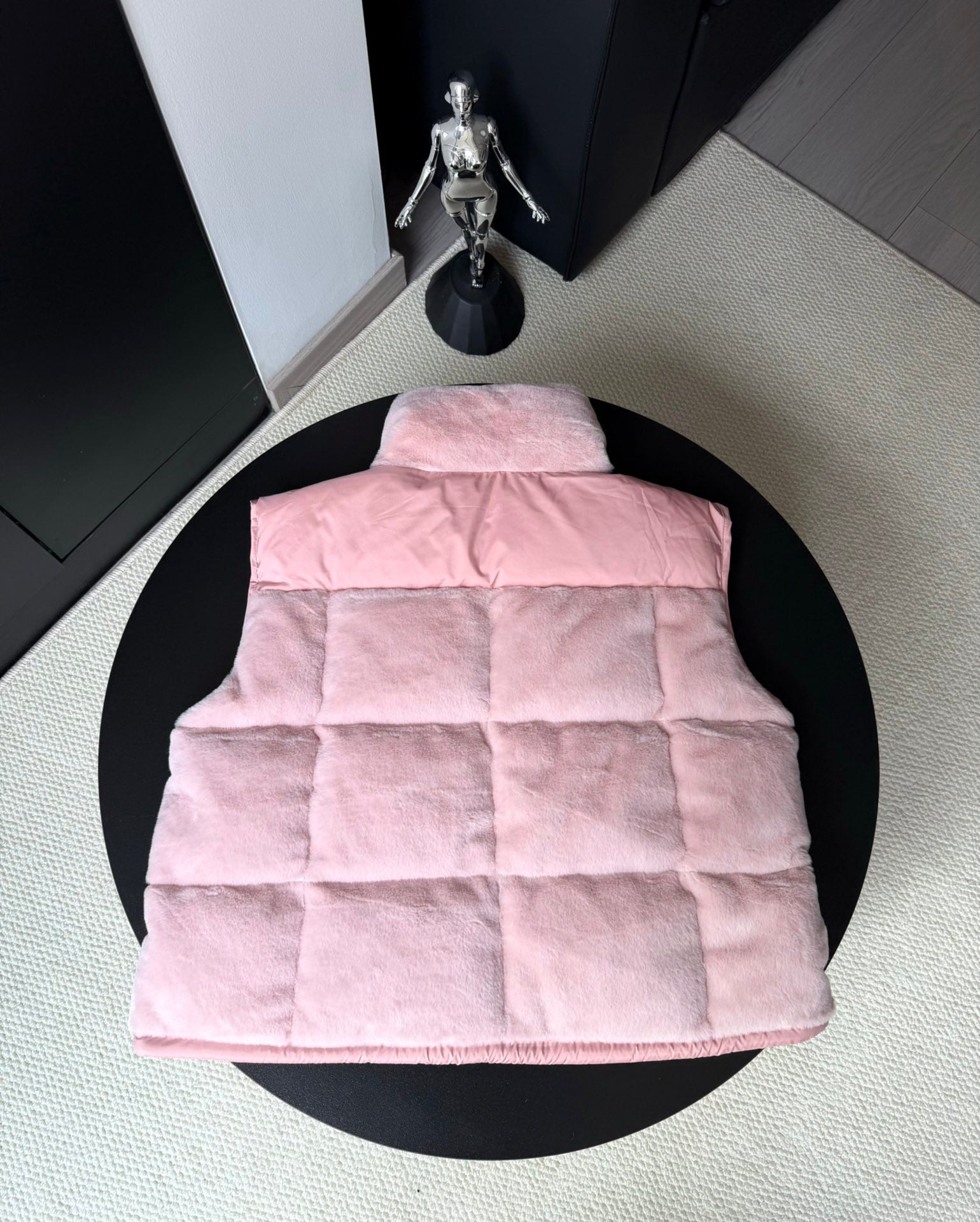 Moncler pink padded hooded gilet, back view with quilted sections