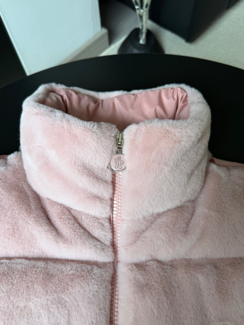 Moncler pink faux-fur hooded gilet with high collar and front zipper