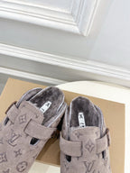 Monogram slide sandals pair, dark taupe suede, padded fuzzy interior and strap buckles