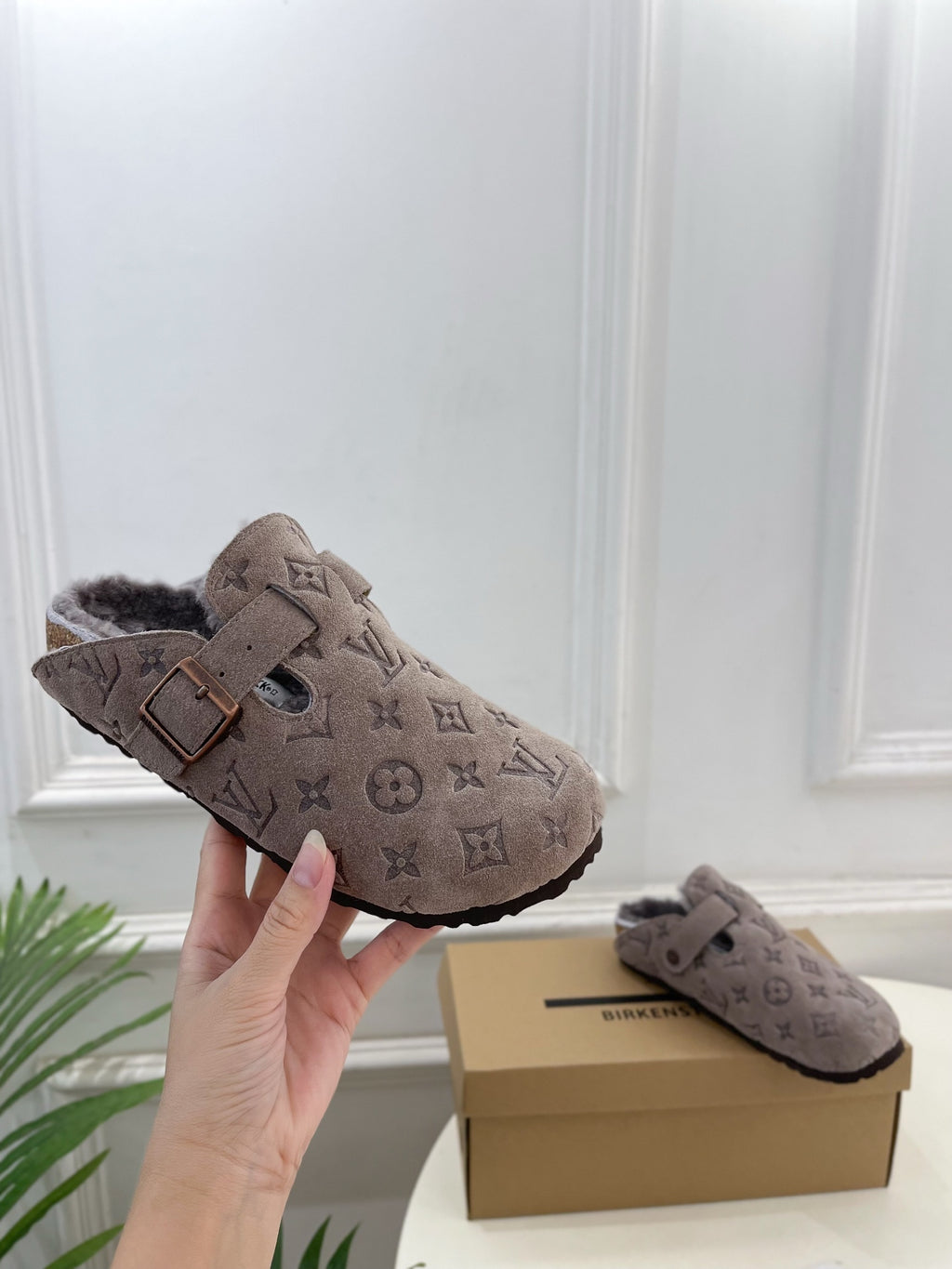 Monogram slide sandals, dark taupe suede, adjustable strap with square buckle, side view