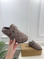 Monogram slide sandals, dark taupe suede, adjustable strap with square buckle, side view