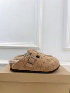 Tan Louis Vuitton monogram buckle slide sandals with plush shearling lining and strap