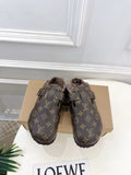 Louis Vuitton monogram sandals with faux-fur lining and adjustable buckles