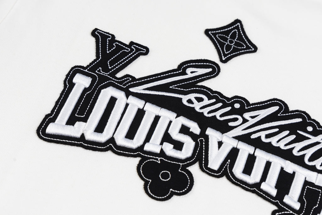 White long-sleeve sweatshirt close-up of Louis Vuitton graphic logo