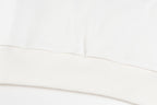 White long-sleeve sweatshirt ribbed hem with double-stitching detail