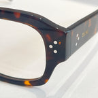 Celine tortoise eyeglass frame close-up with round clear lenses