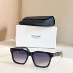 Celine glasses with black square frames and purple-tinted lenses.