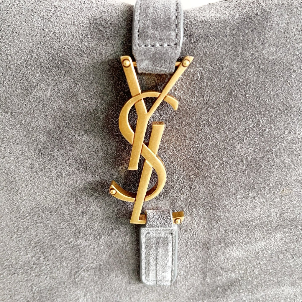 YSL bag, gray leather charm with gold YSL monogram and small hardware