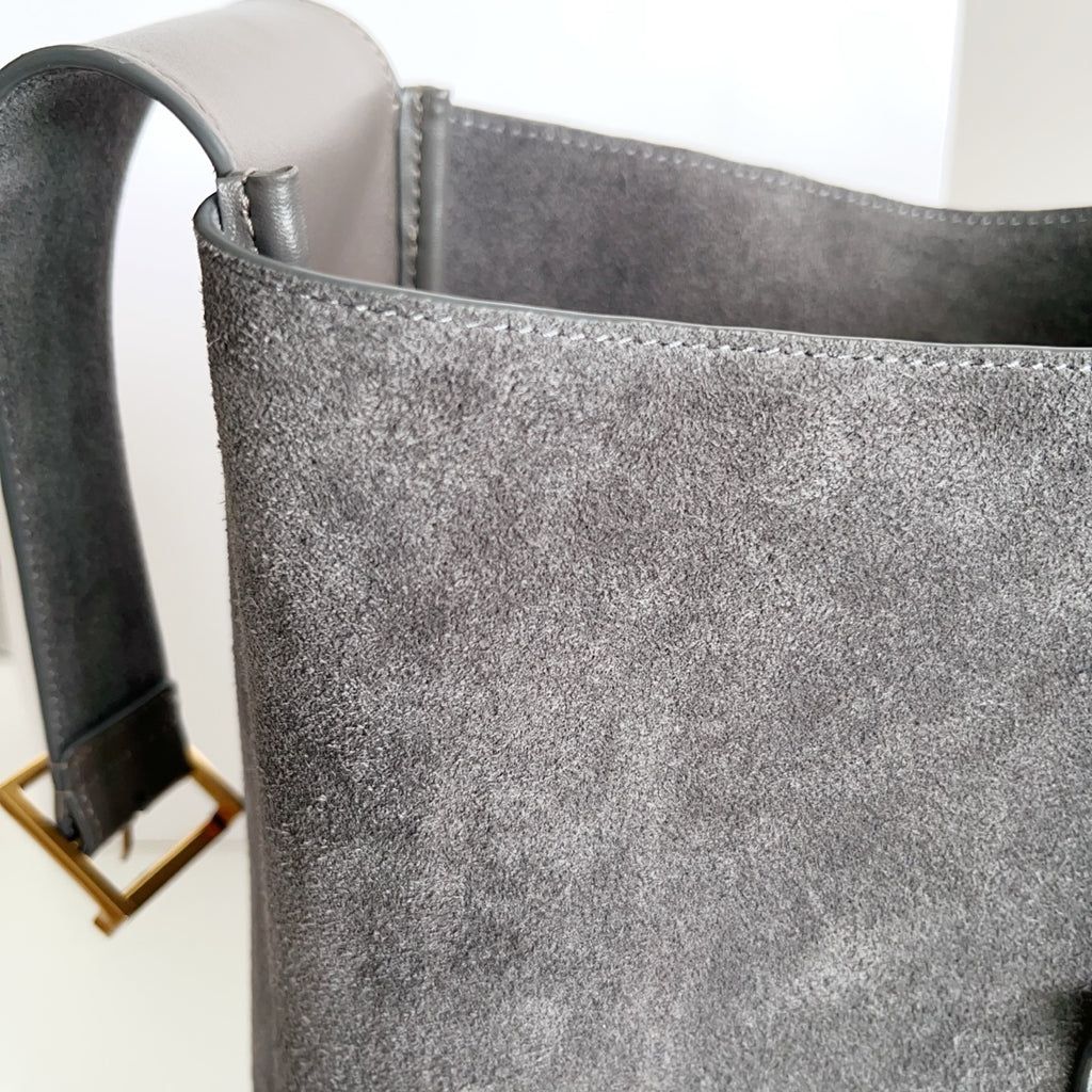 YSL bag, gray suede side panel with stitched top opening and dark lining