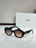 Celine round sunglasses with dark lenses and black acetate frames