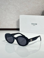 Celine round sunglasses with dark lenses and black acetate frames