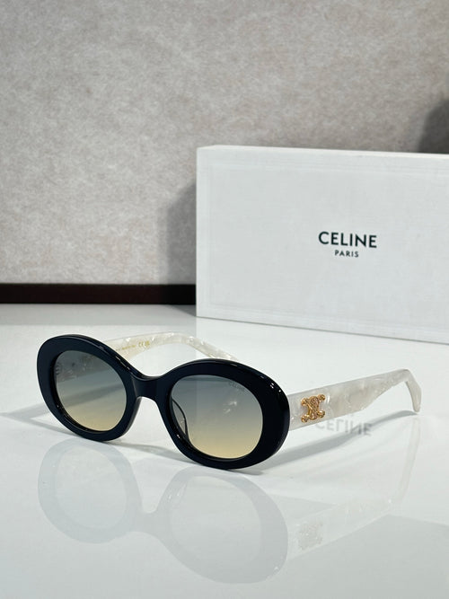 Celine oversized cat-eye sunglasses with dark lenses and black frames