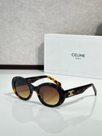 Celine cat-eye sunglasses with dark lenses and tortoise acetate frames