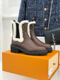 Brown Louis Vuitton ladies ankle boots with monogram panels and white faux-fur trim